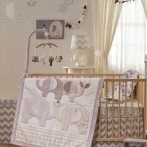 BRAND NEW LOLLI Living “NATURI ELEPHANTS BABY QUILT.”  Gray. Size 37” x 45”.